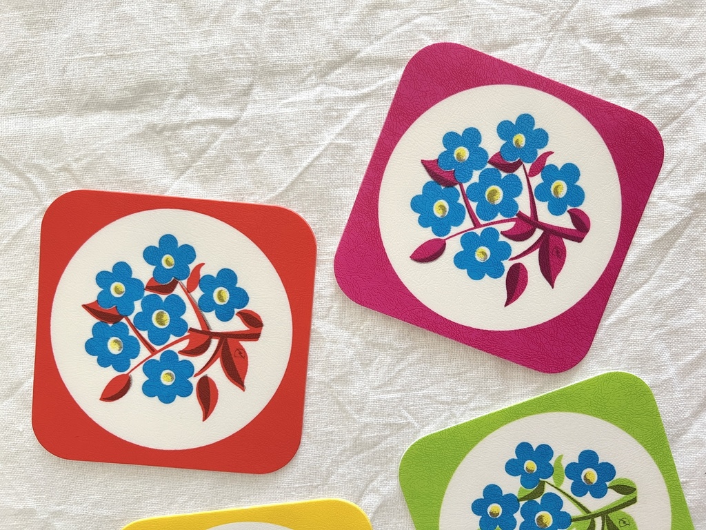 Ensemble de 6 sous-verres fleuris en plastique