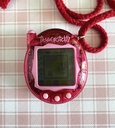 Jouet électronique Tamagotchi rose - 2004