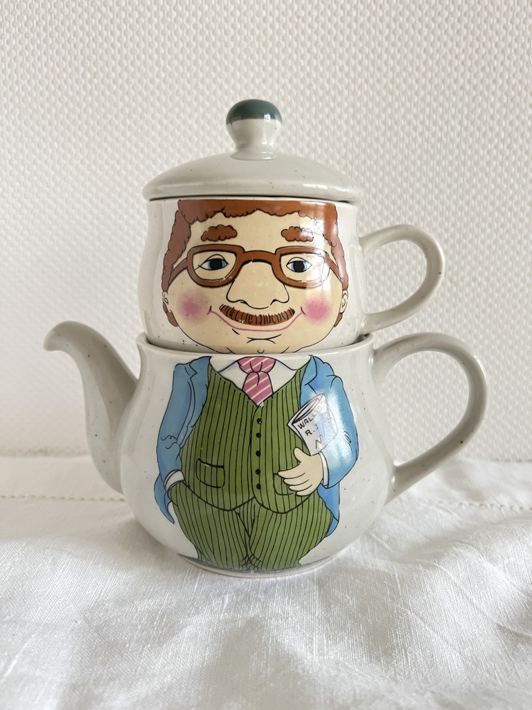 Théière avec tasse Homme d'affaires